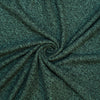 Dark green texturedblanket with a heathered speckled pattern, arranged in a spiral drape to show its texture and flexibility.