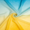 Close-up of cashmere scarf with blue and yellow gradient