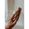 Long handle body brush for exfoliating hard-to-reach areas