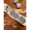 Stainless steel garlic press and herb stripper